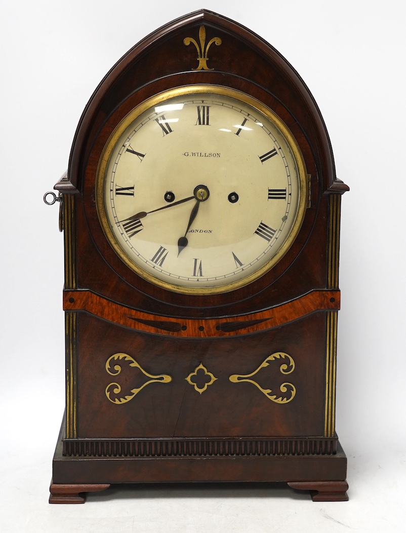 An early 19th century brass inlaid mahogany lancet shaped mantel clock by G. Willson of London, with pendulum and door-key, no winding key, 45cm. Condition - fair to good, not tested as working